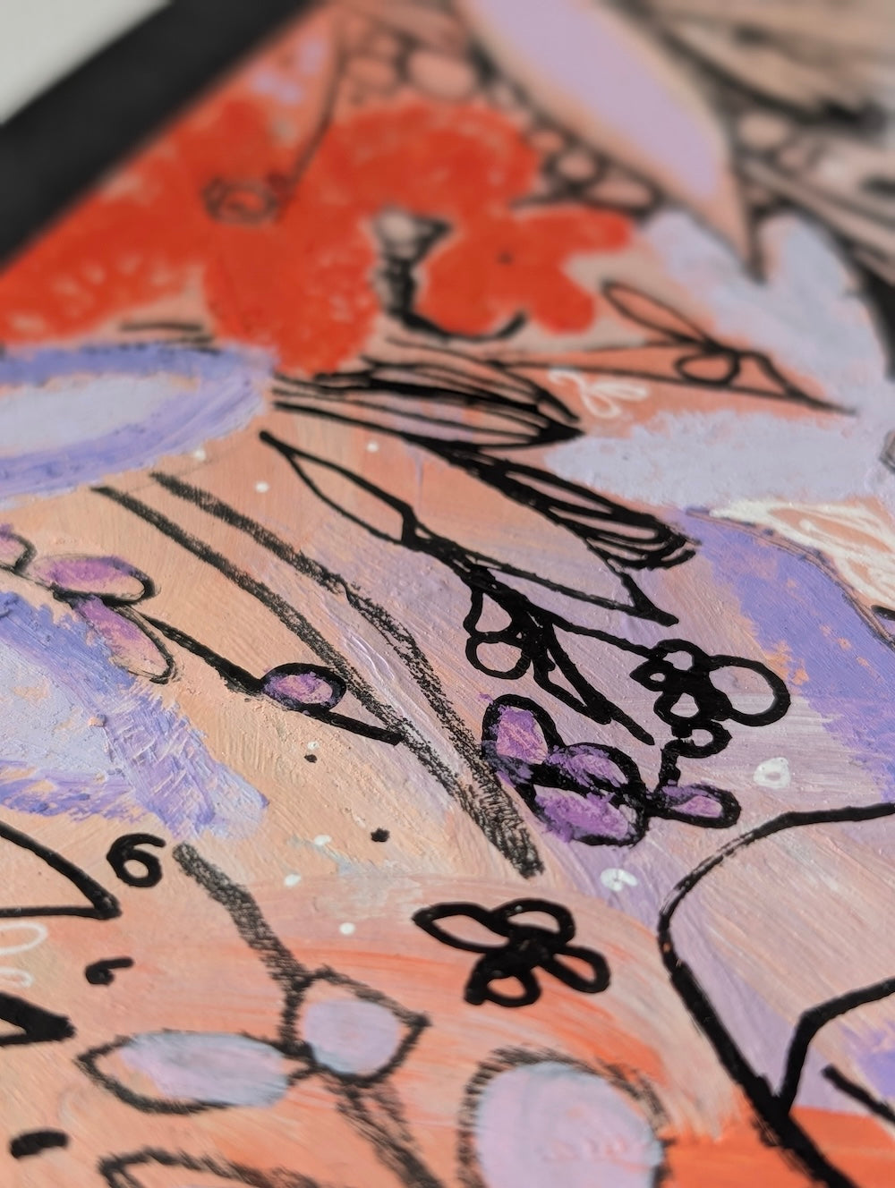 Close-up of an abstract painted artwork  by Briana Feola with expressive brushstrokes in coral orange, lavender purple, pale peach, and black linework.